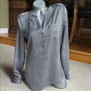 The limited black-and-white abstract print blouse